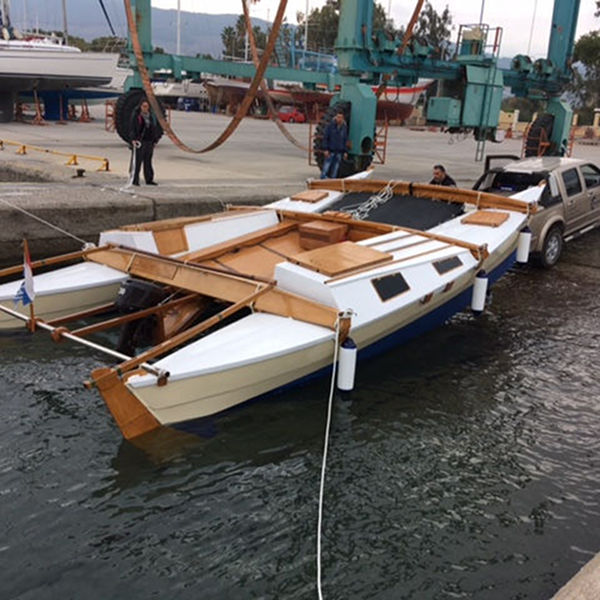 Catamaran being launched from a ramp