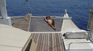 Sunbathing on the bow netting