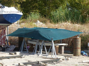 A small makeshift shelter at the boatyard