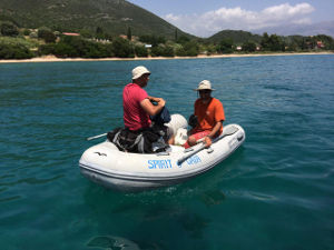 Julius and Fabio in a rubber dinghy