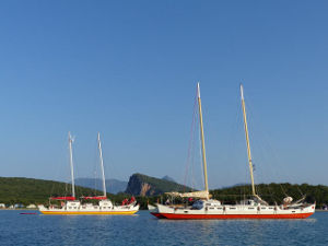 Two catamarans anchored next to each other