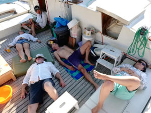 Crew lying down on deck