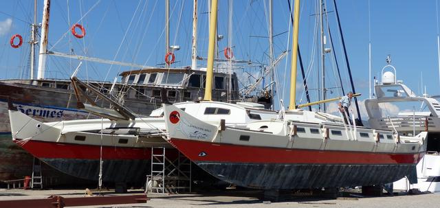 Gaia on land in the marina with her masts raised