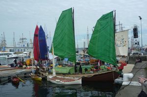 Vietnamese Junk boat with green sails