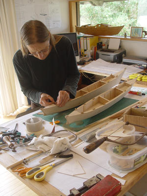 Hanneke building Amatasi model on a workbench