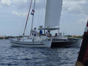 Big Wharram cat under sail