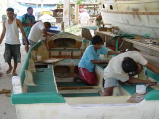Boat builders at work