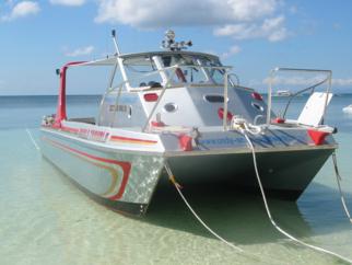 Motor catamaran on the water