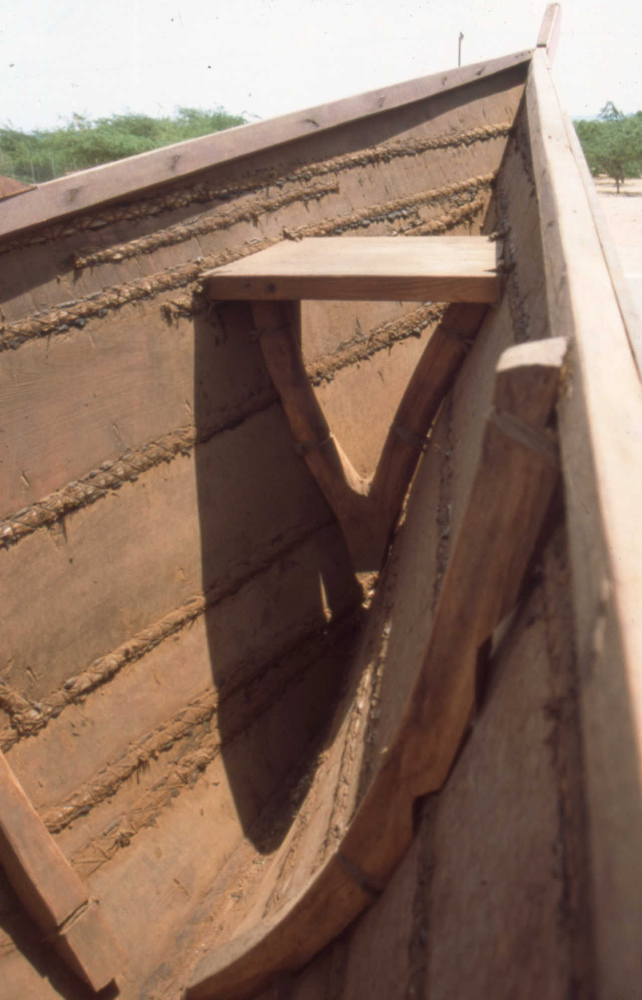 The bow of a small wooden boat