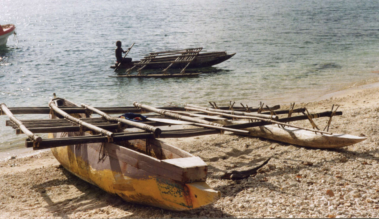 Outrigger canoes on the beach