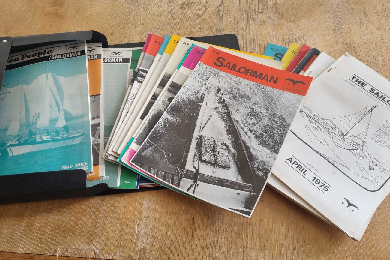 Magazines spread across a wooden surface