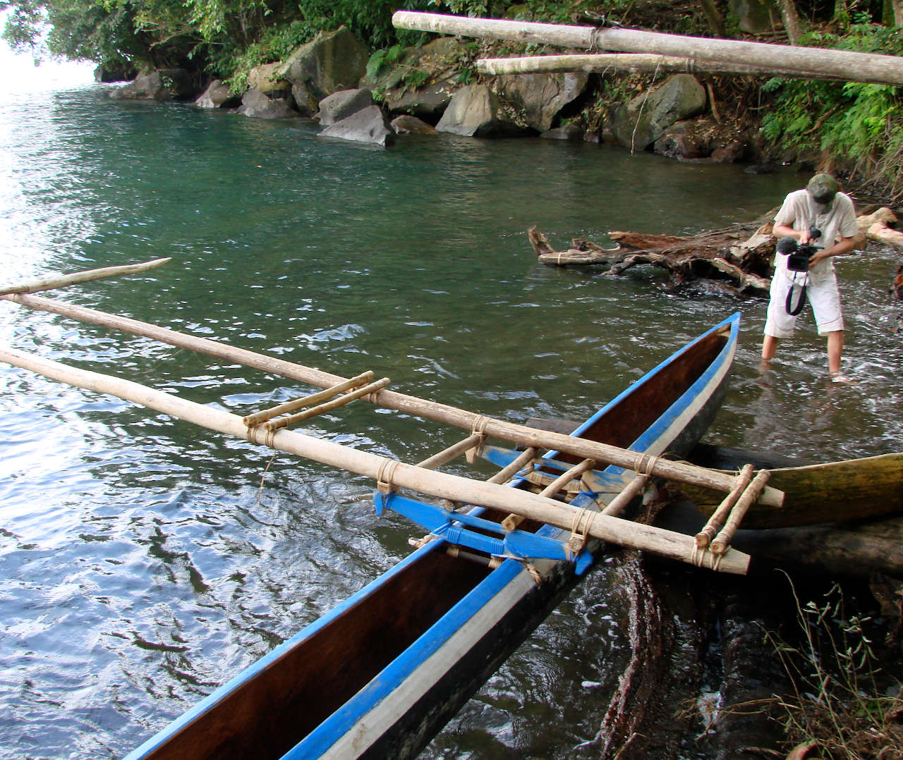 Outrigger canoe on shore