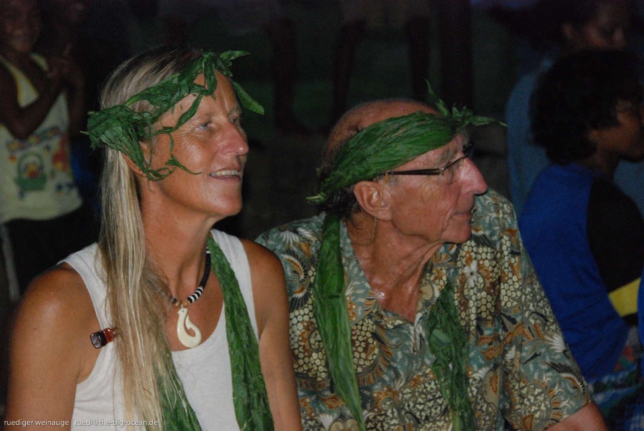 Hanneke and James wearing headdresses