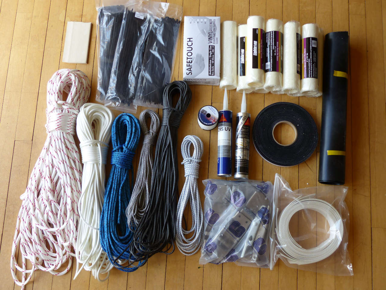 Bags of ropes, glue, tape, gloves