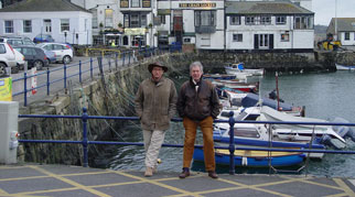 James leaning against a rail, Falmouth harbour