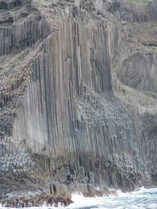 Huge basalt column of rock look like a church organ