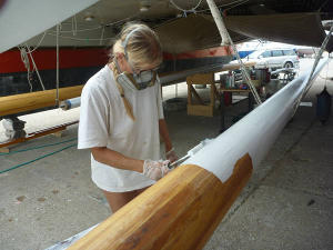 Hanneke working on gaffs and masts underneath Gaia
