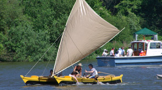 Tahiti Wayfarer sailing on a lake