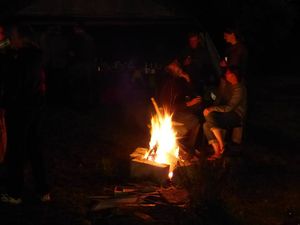 People gathered around a fire