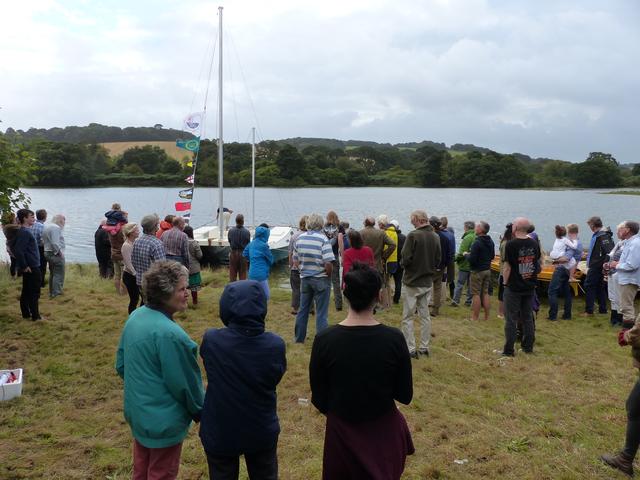 Many people gathered at Wharram HQ. Mana is on the water behind them.