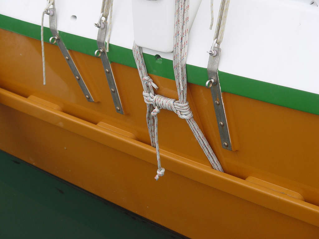 Lashings holding a beam in place on a boat