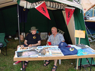Ken hook and Dirk sat at an exhibition stand