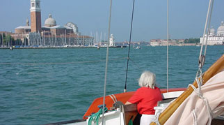 Ruth looking out to a marina from Gaia
